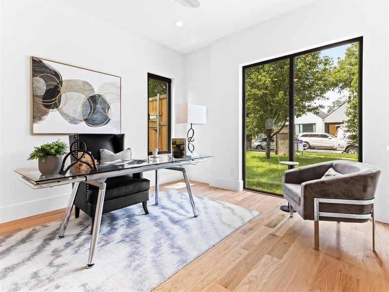 Office space featuring light hardwood / wood-style floors