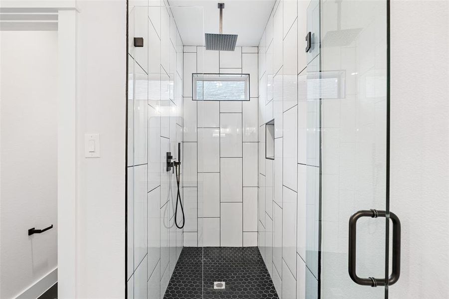 Bathroom featuring an enclosed shower