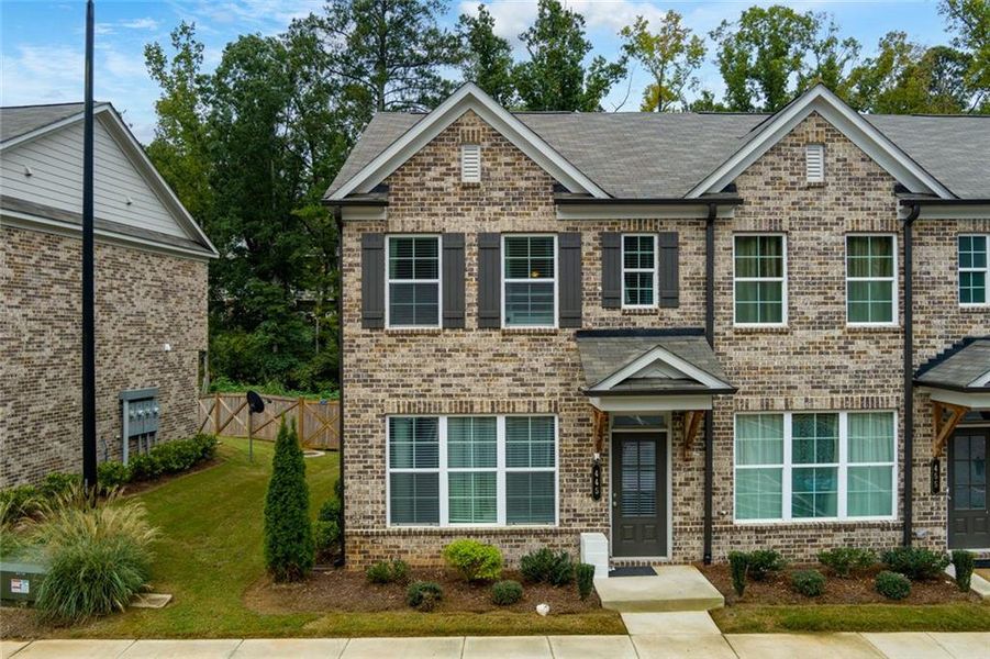 Front exterior of a new home in , Lawrenceville, GA, highlighting curb appeal (Image 21).