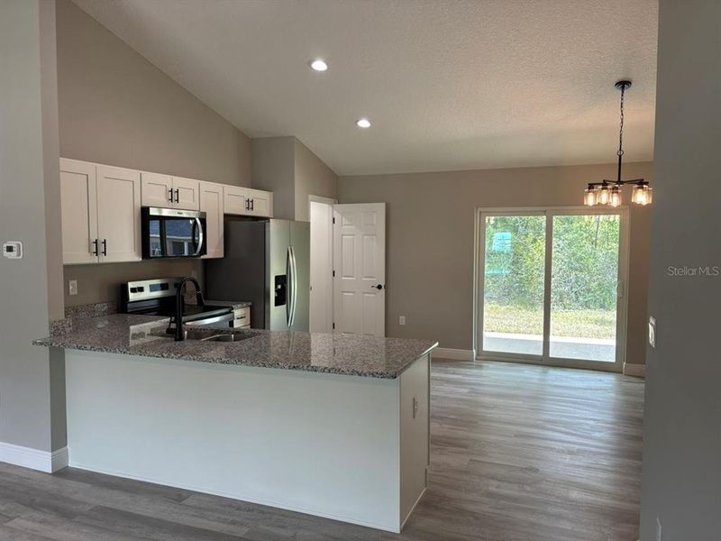 Furnished interior view inside a new home in , Dunnellon (Image 6).