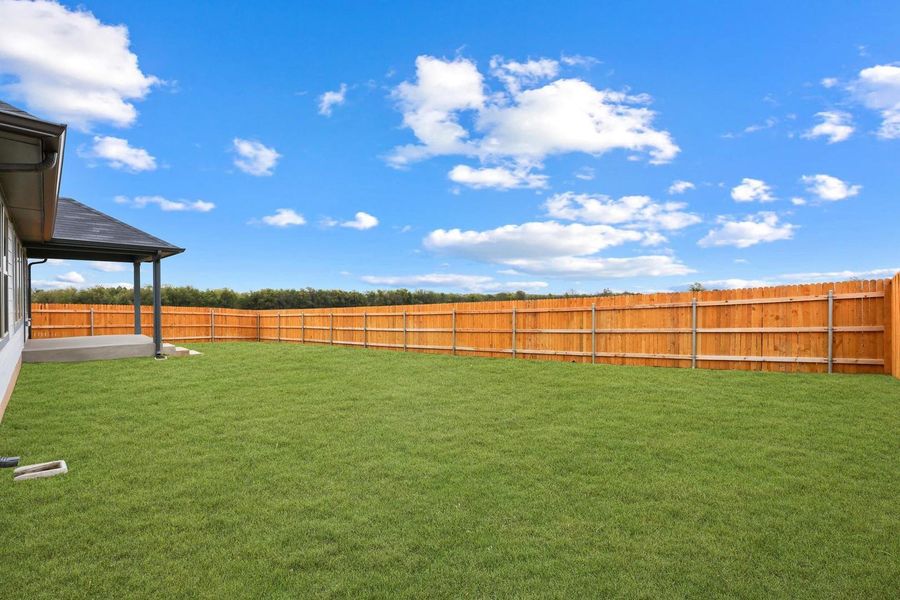 Exterior details and patio area of a home in Prairie Winds, Hutto (Image 23). Exterior details and patio area of a home in Prairie Winds, Hutto (Image 23).