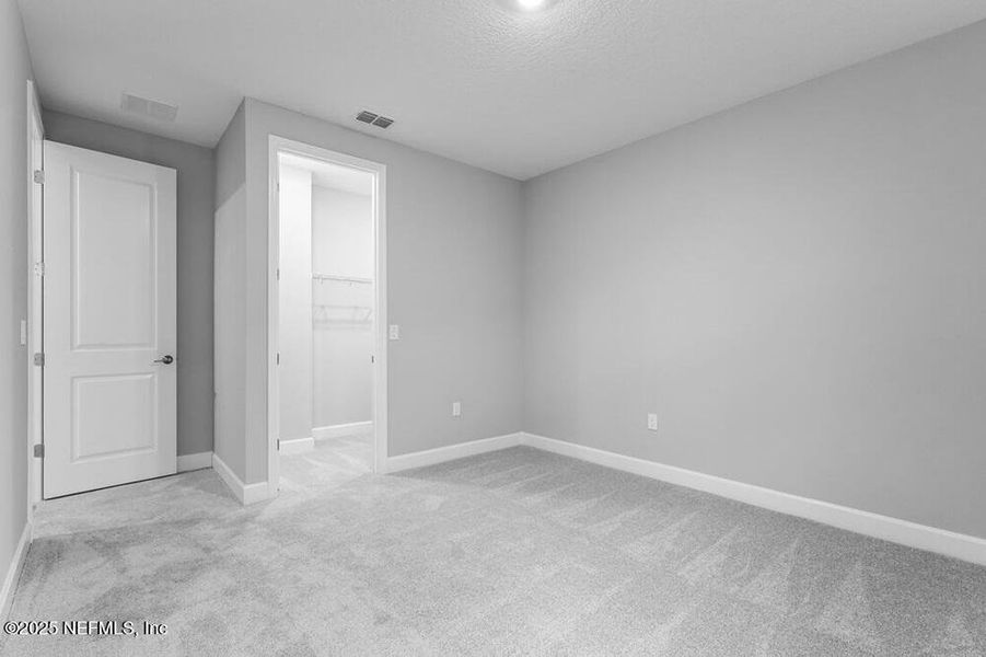 Spacious, unfurnished interior of a new home in Colbert Landings, Palm Coast (Image 19).