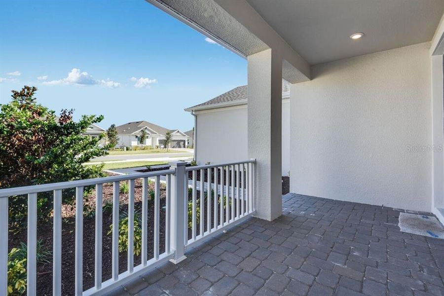Exterior details and patio area of a home in Ardisia Park, New Smyrna Beach (Image 25).