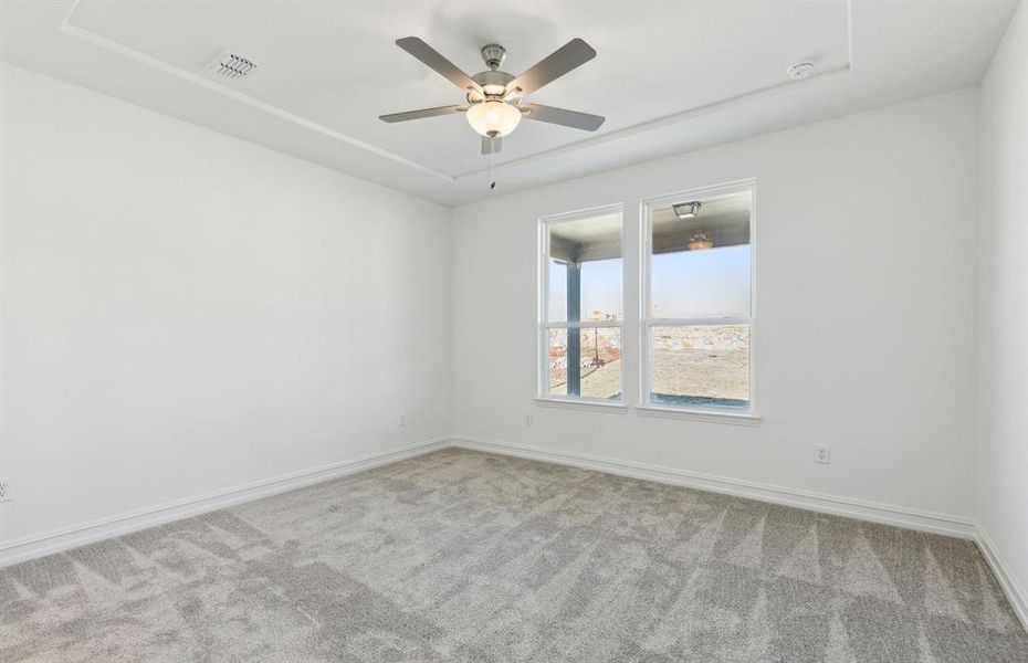 Elegant owner's suite with large windows *real home pictured Elegant owner's suite with large windows *real home pictured