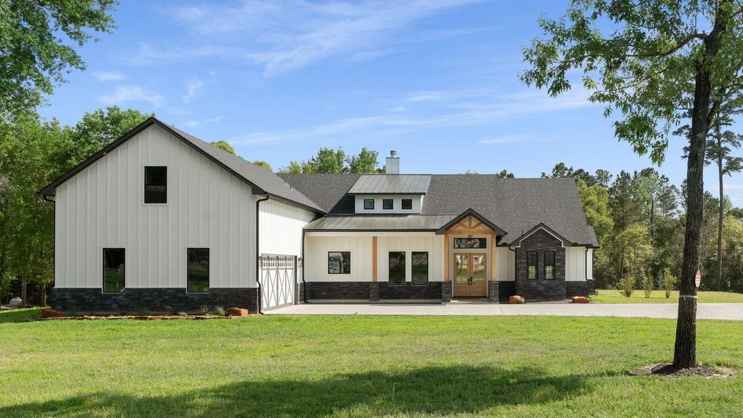 Front exterior of a new home in , Montgomery, TX, highlighting curb appeal (Image 26).