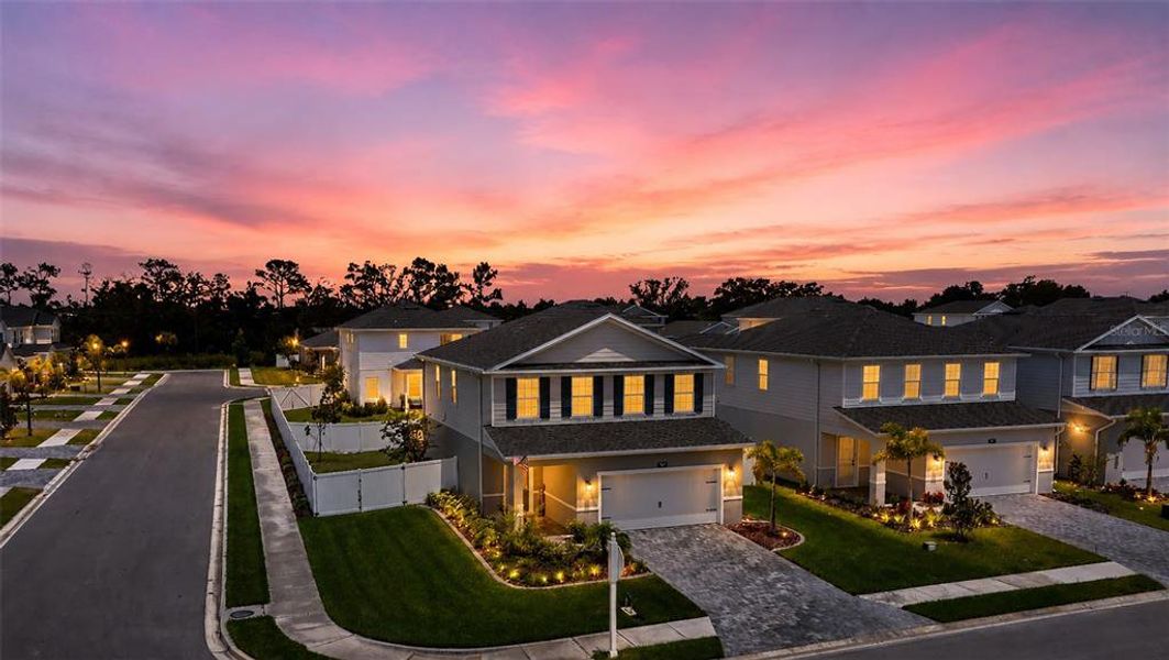 Front exterior of a new home in , Bradenton, FL, highlighting curb appeal (Image 22).