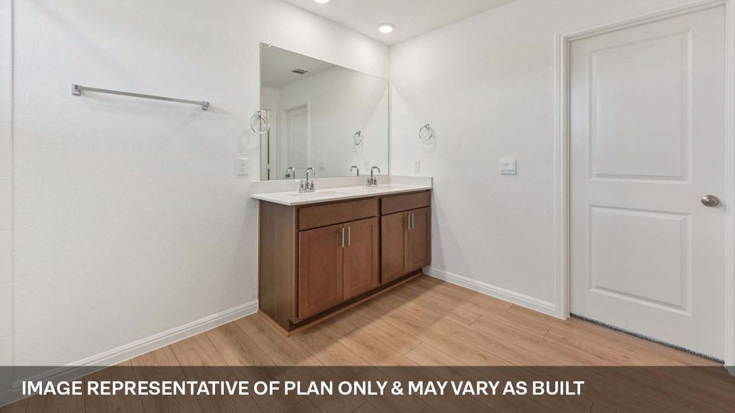 Representative furnished interior of a home built from the The Lakeway by D.R. Horton in Carillon, Manor (Image 9).
