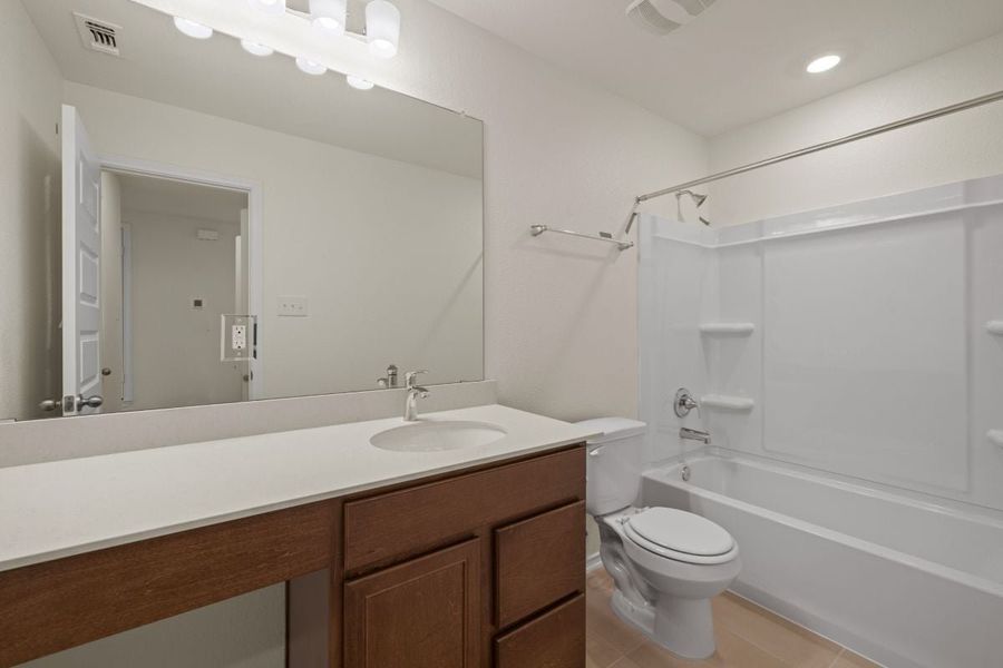 Furnished interior view inside a new home in Sonterra - Cool Water, Jarrell (Image 9).