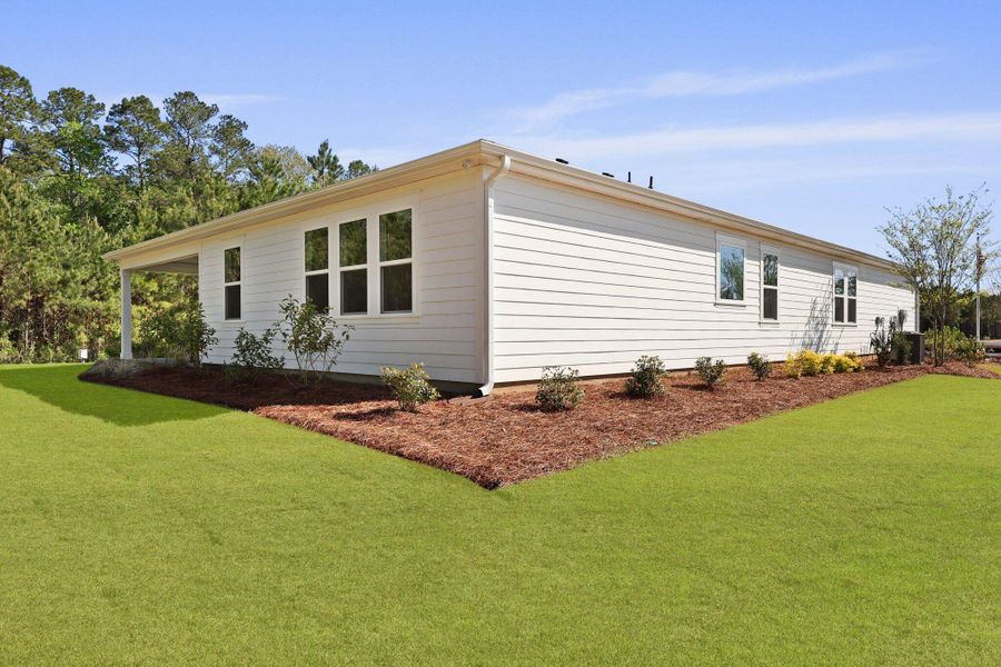 Exterior details and patio area of a home in Berkeley Bay, Ridgeville (Image 4).