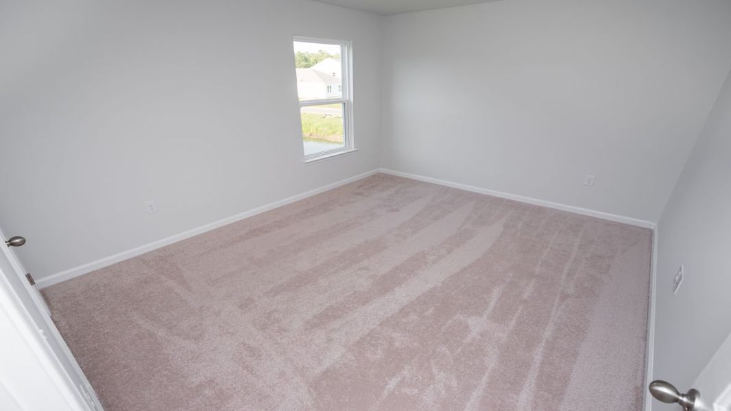 Spacious, unfurnished interior of a new home in Cedar Hill Landing, Navassa (Image 30).