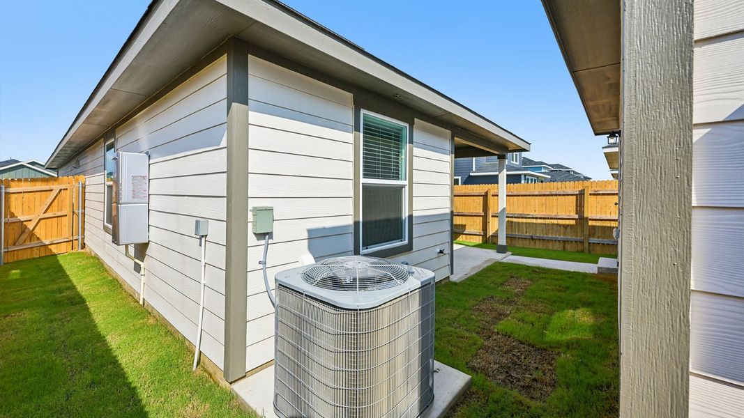 Exterior details and patio area of a home in Valverde, Bastrop (Image 22).