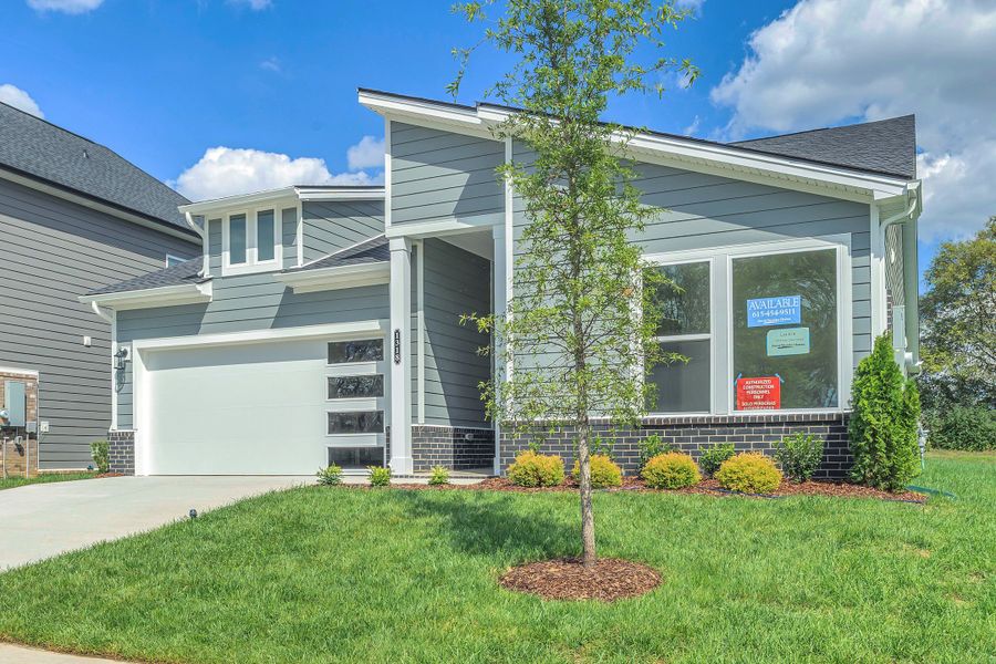 Exterior details and patio area of a home in Nexus – Village Collection, Gallatin (Image 17).