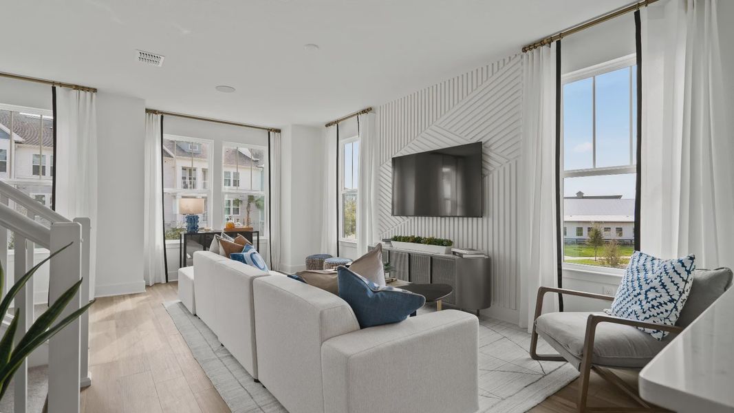 Representative furnished interior of a home built from the Lantana End Unit by DRB Homes in Parkview at Hamlin, Winter Garden (Image 13).