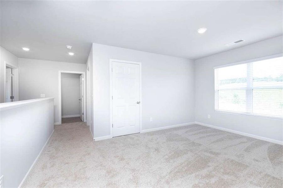 Spacious, unfurnished interior of a new home in The Reserve at Calcutta, Stockbridge (Image 26).