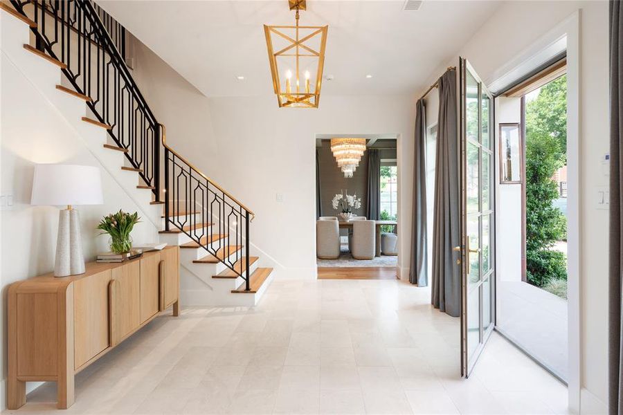 Foyer with adjacent dining room