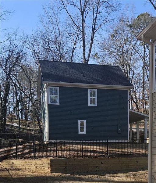 Front exterior of a new home in , Atlanta, GA, highlighting curb appeal (Image 1).