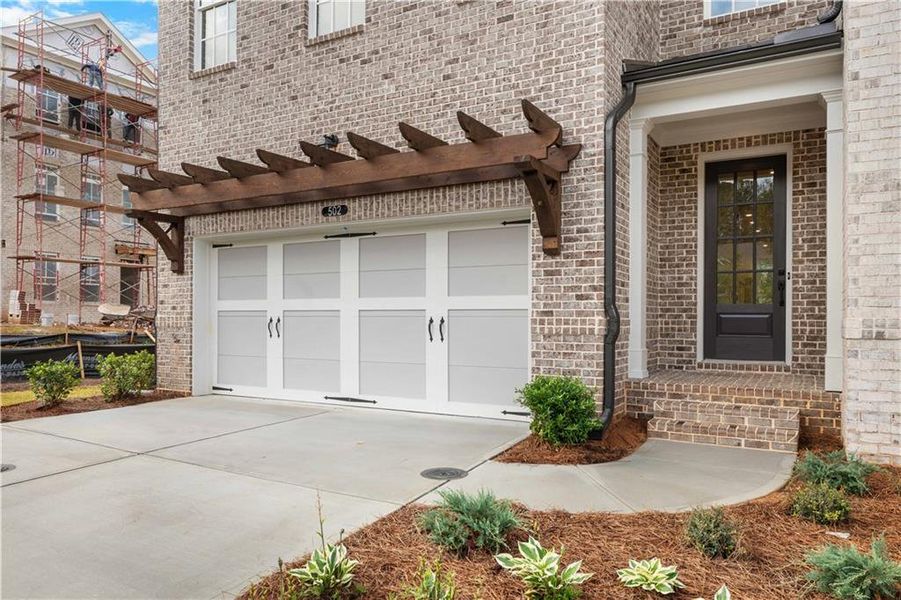 Exterior details and patio area of a home in Ward's Crossing Townhomes, Johns Creek (Image 3). Exterior details and patio area of a home in Ward's Crossing Townhomes, Johns Creek (Image 3).