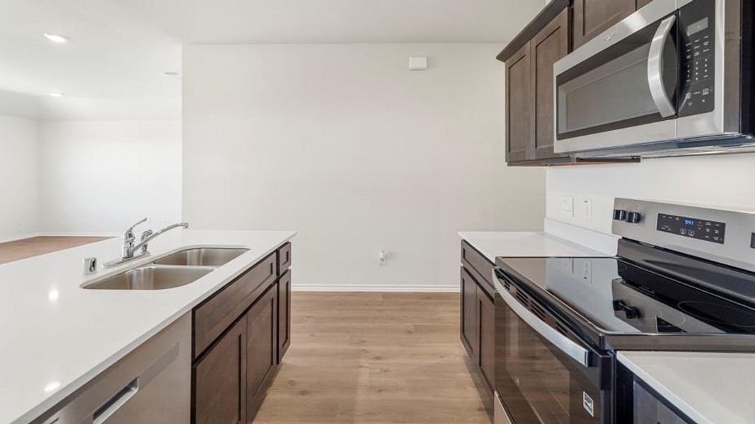 Furnished interior view inside a new home in Creeks at Burnett Trail, Canton (Image 7). Furnished interior view inside a new home in Creeks at Burnett Trail, Canton (Image 7).