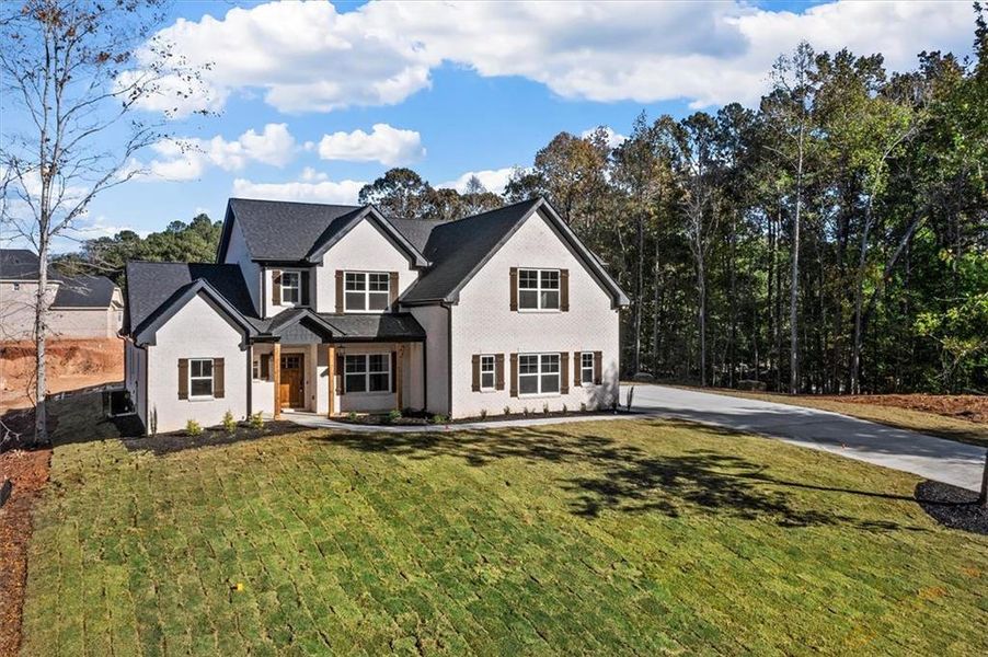 Front exterior of a new home in , Atlanta, GA, highlighting curb appeal (Image 36).