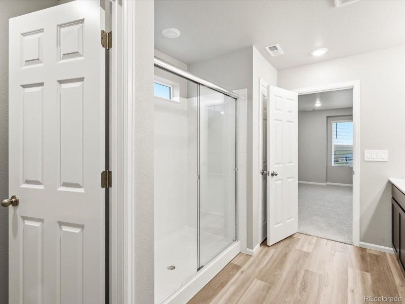 Spacious, unfurnished interior of a new home in Buffalo Highlands: The Flora Collection, Commerce City (Image 24). Spacious, unfurnished interior of a new home in Buffalo Highlands: The Flora Collection, Commerce City (Image 24).