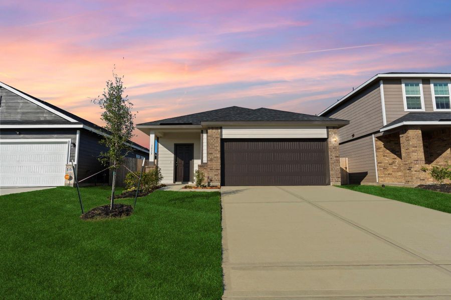 Lovely view of the home’s front exterior highlighting the covered entryway and lush landscaping—perfect for relaxing with a morning coffee while greeting friendly neighbors! Located in Sweetgrass Village with parks, a clubhouse, pickleball courts, and a sparkling pool for year-round enjoyment! What a place to call home! No flooding during any of the storms! Move in ready! Energy saving home to save you money! Lovely view of the home’s front exterior highlighting the covered entryway and lush landscaping—perfect for relaxing with a morning coffee while greeting friendly neighbors! Located in Sweetgrass Village with parks, a clubhouse, pickleball courts, and a sparkling pool for year-round enjoyment! What a place to call home! No flooding during any of the storms! Move in ready! Energy saving home to save you money!