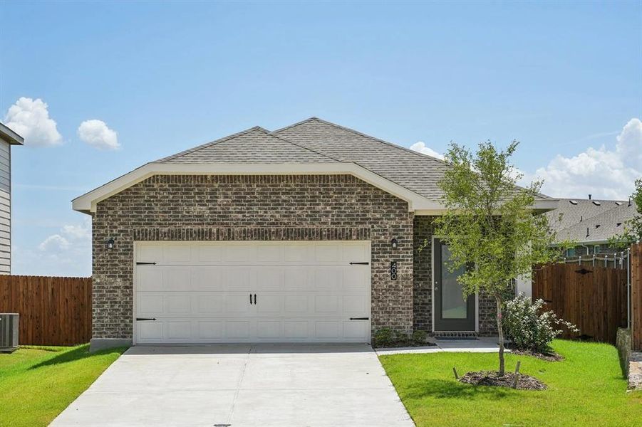 Front exterior of a new home in Windmill Farms, Forney, TX, highlighting curb appeal (Image 22).