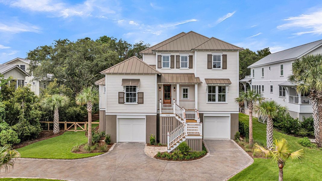 Front exterior of a new home in , Mount Pleasant, SC, highlighting curb appeal (Image 2). Front exterior of a new home in , Mount Pleasant, SC, highlighting curb appeal (Image 2).