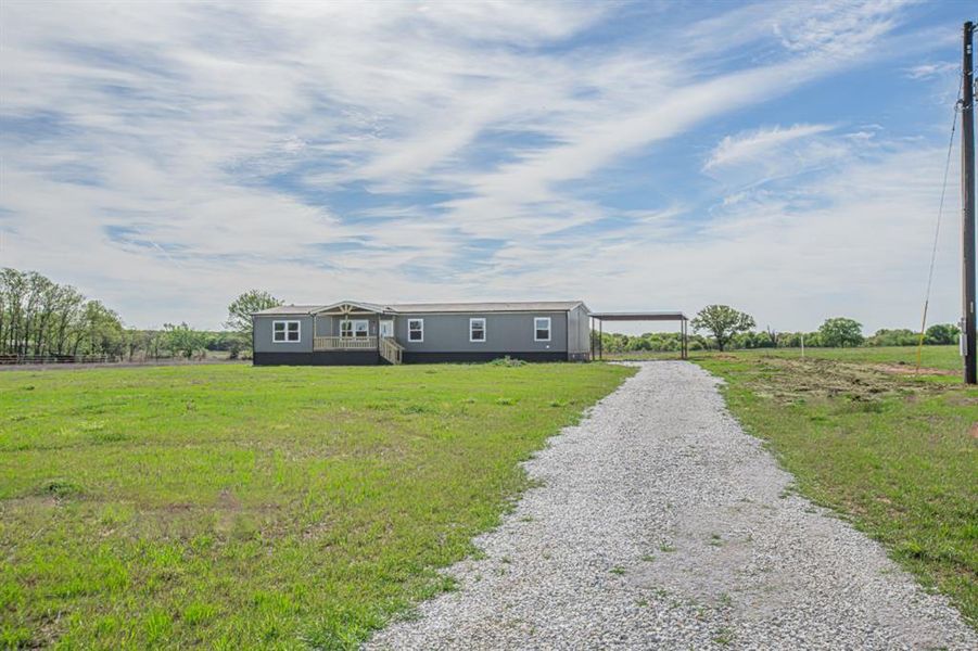 Exterior details and patio area of a home in , Sunset (Image 21).
