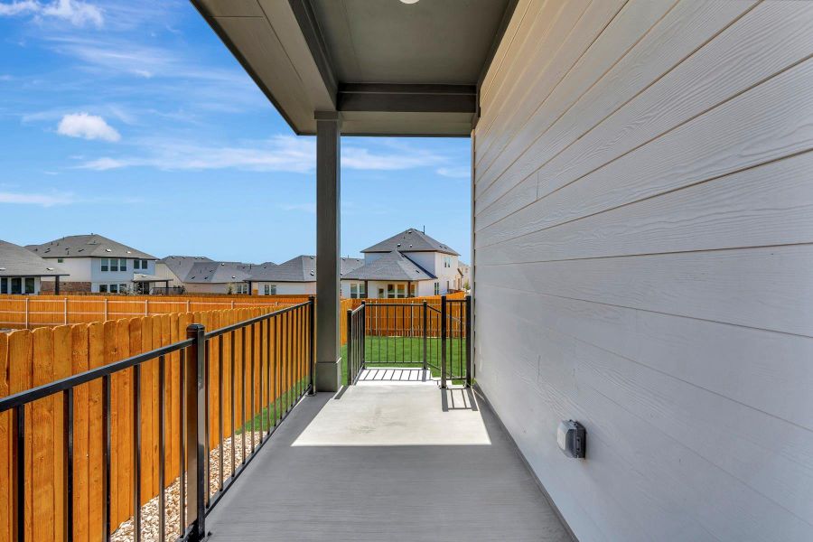 Exterior details and patio area of a home in Heritage, Dripping Springs (Image 3).