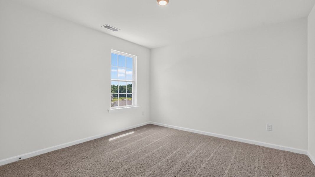Spacious, unfurnished interior of a new home in The Reserve at Prestleigh, Wake Forest (Image 28).