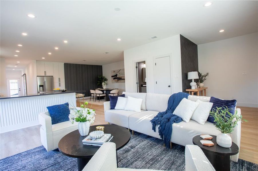 Living room featuring hardwood / wood-style flooring