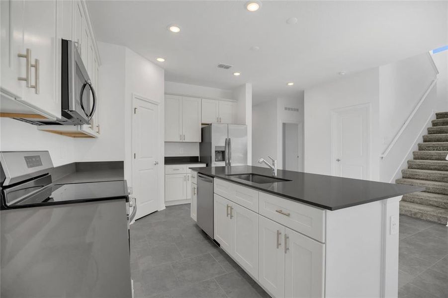 Furnished interior view inside a new home in Rhett's Ridge: Estates Alley Collection, Apopka (Image 7). Furnished interior view inside a new home in Rhett's Ridge: Estates Alley Collection, Apopka (Image 7).