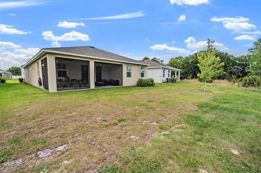 Exterior details and patio area of a home in Deerbrook, Land O' Lakes (Image 20).
