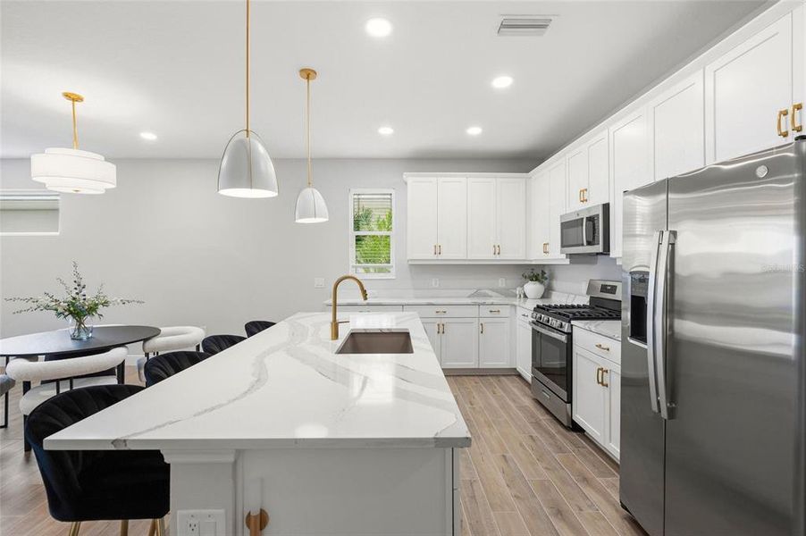 Furnished interior view inside a new home in LakeHouse Cove at Waterside, Sarasota (Image 14). Furnished interior view inside a new home in LakeHouse Cove at Waterside, Sarasota (Image 14).