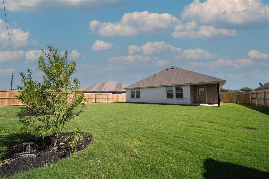 Exterior details and patio area of a home in , Springtown (Image 4).