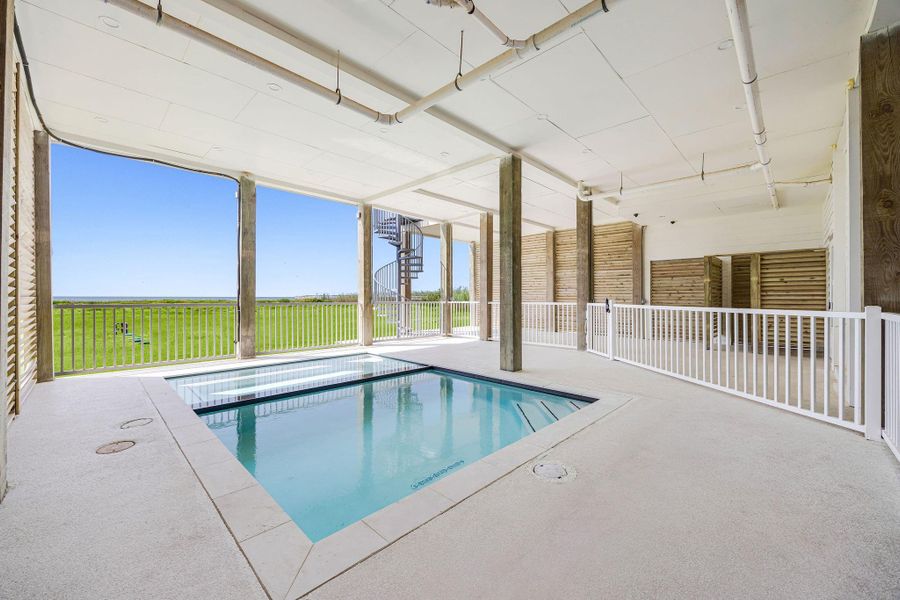 Exterior details and patio area of a home in , Galveston (Image 31).