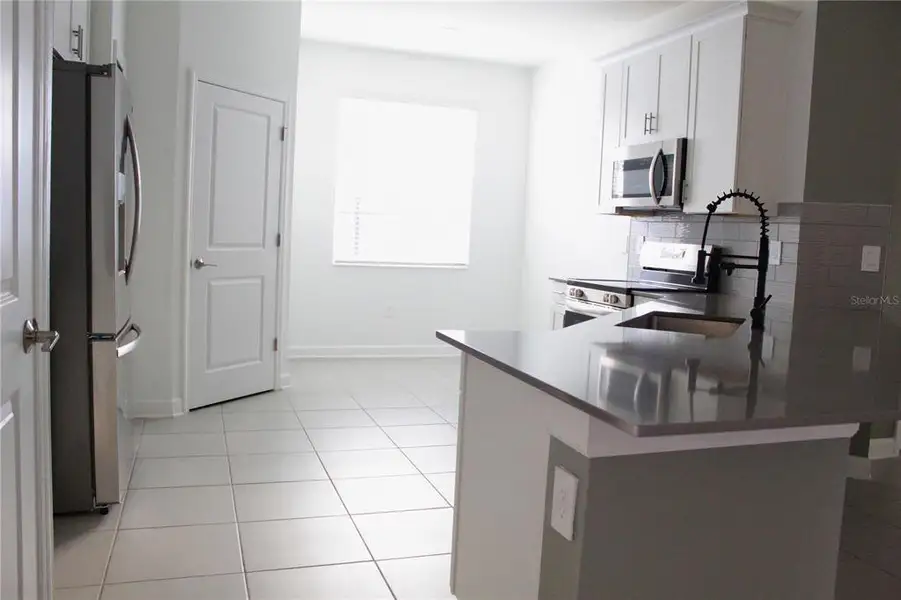 Furnished interior view inside a new home in , Davenport (Image 4).