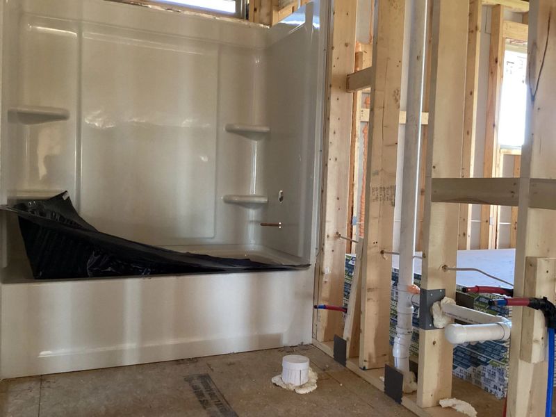 In-progress construction of a new home in The Homestead at Lariat, Liberty Hill, TX (Image 16).