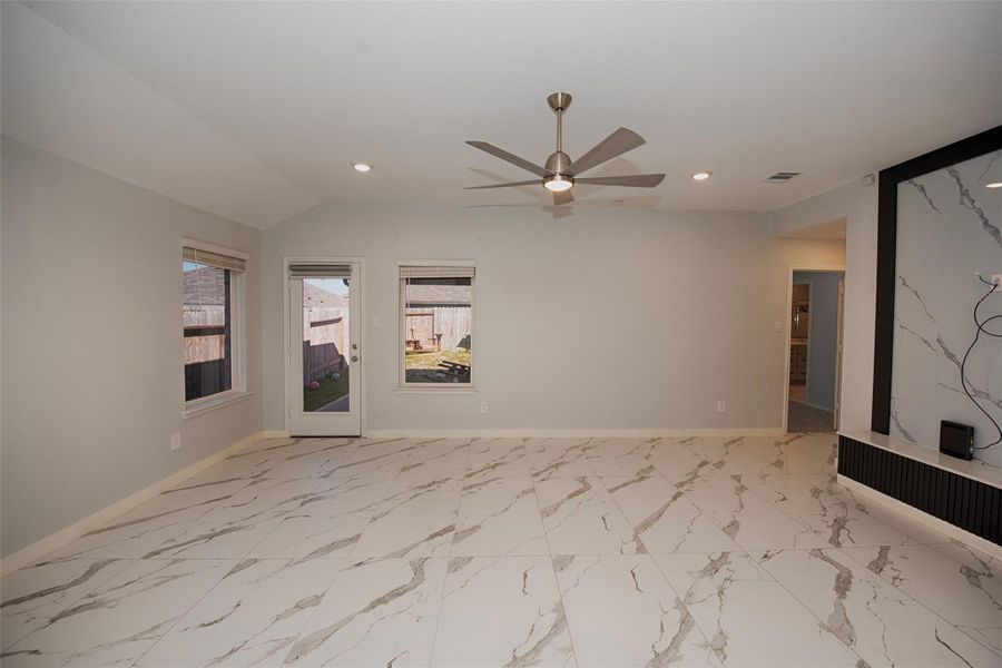 Gorgeous family room with vaulted ceiling and fabulous space. Gorgeous family room with vaulted ceiling and fabulous space.