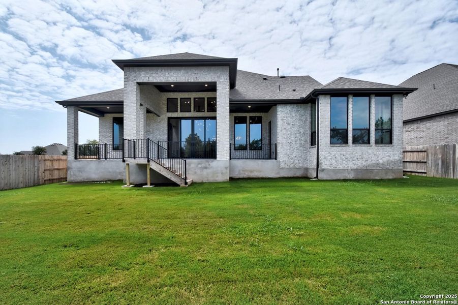 Front exterior of a new home in La Cima: 70ft. lots, San Marcos, TX, highlighting curb appeal (Image 2). Front exterior of a new home in La Cima: 70ft. lots, San Marcos, TX, highlighting curb appeal (Image 2).