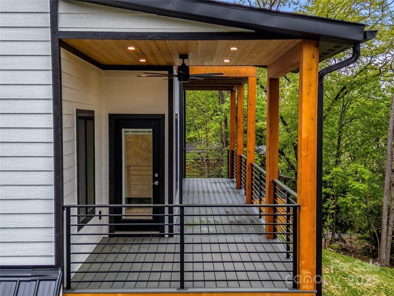 Exterior details and patio area of a home in , Mills River (Image 25).