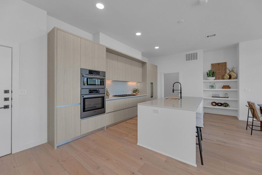 Furnished interior view inside a new home in One Oak, Austin (Image 10).