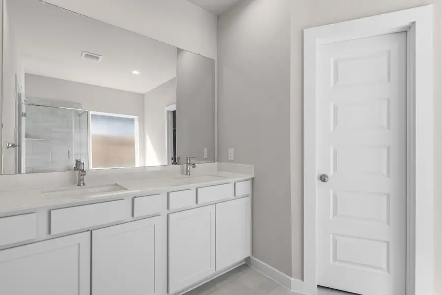 Furnished interior view inside a new home in Barton Creek Ranch, Conroe (Image 5).