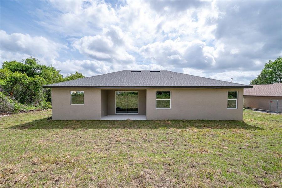 Exterior details and patio area of a home in , North Port (Image 27).