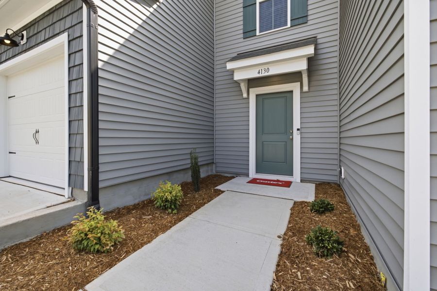 Exterior details and patio area of a home in Carpenter Falls, Durham (Image 4).