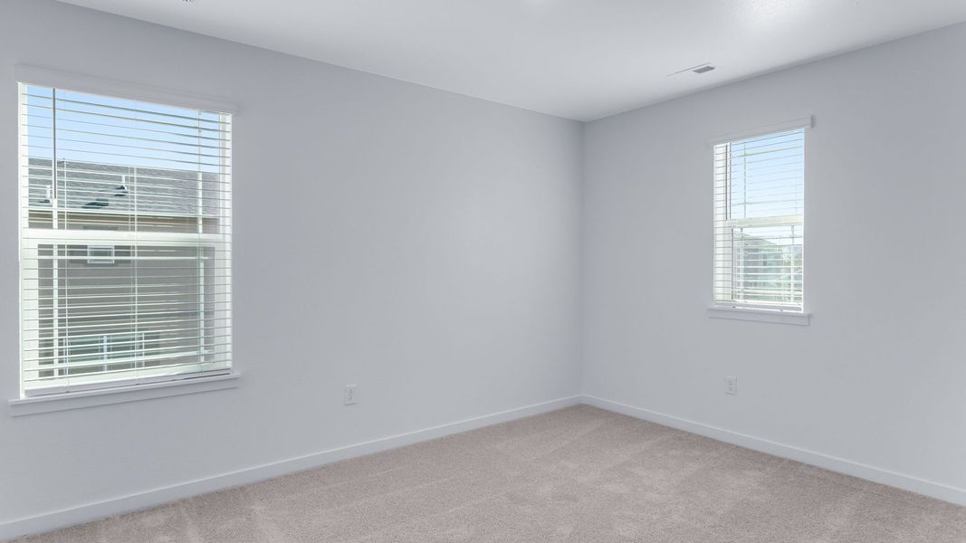 Representative unfurnished interior of a home built from the Calhan by D.R. Horton in Vantage, Berthoud (Image 27).