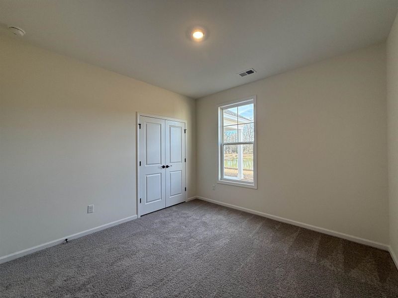 Spacious, unfurnished interior of a new home in Westwood Reserve, Conway (Image 29).