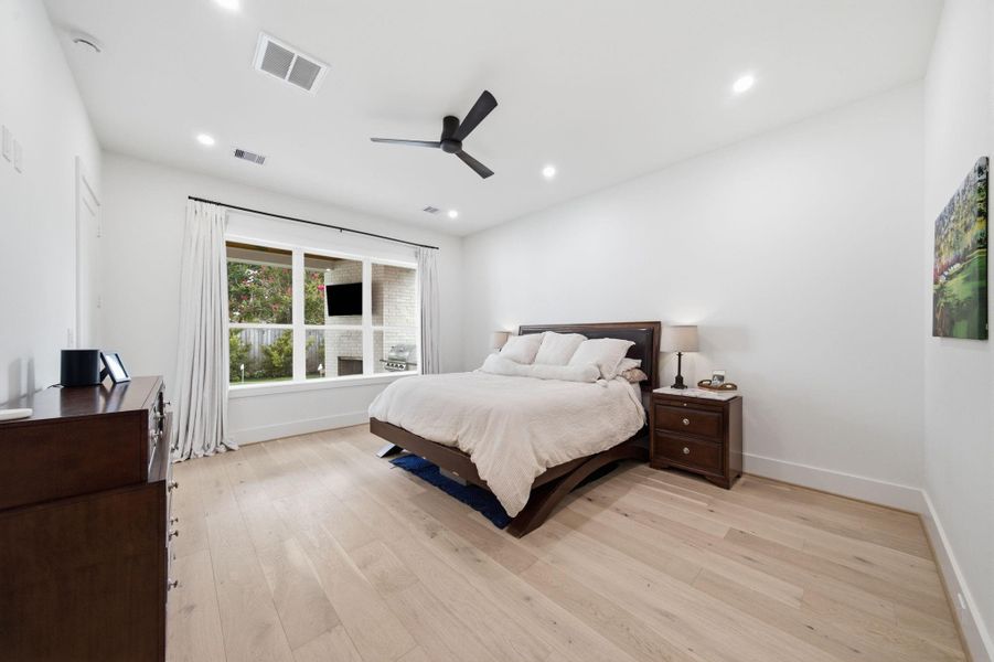 Primary Bedroom overlooking the backyard and patio. Primary Bedroom overlooking the backyard and patio.