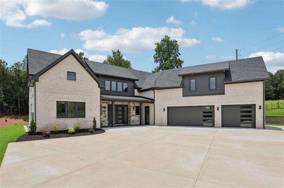 Front exterior of a new home in , Braselton, GA, highlighting curb appeal (Image 48). Front exterior of a new home in , Braselton, GA, highlighting curb appeal (Image 48).