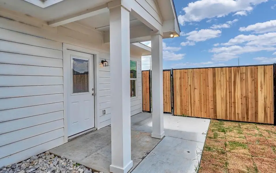 Doorway to property with a patio